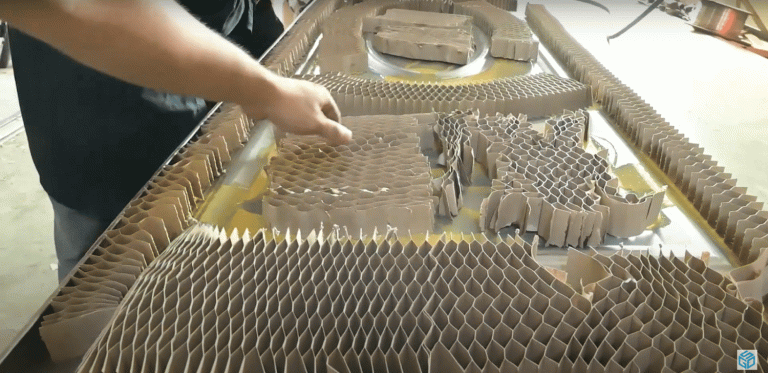 Quy trình sản xuất cửa thép chống cháy làm cửa thoát hiểm, cửa ngăn cháy, cửa chậm cháy chi tiết 16 Thoa keo chống cháy và giấy tổ ong HONEYCOMB lên tấm thép