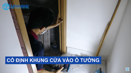 Cố định khung cửa vào ô tường Cố định khung cửa vào ô tường