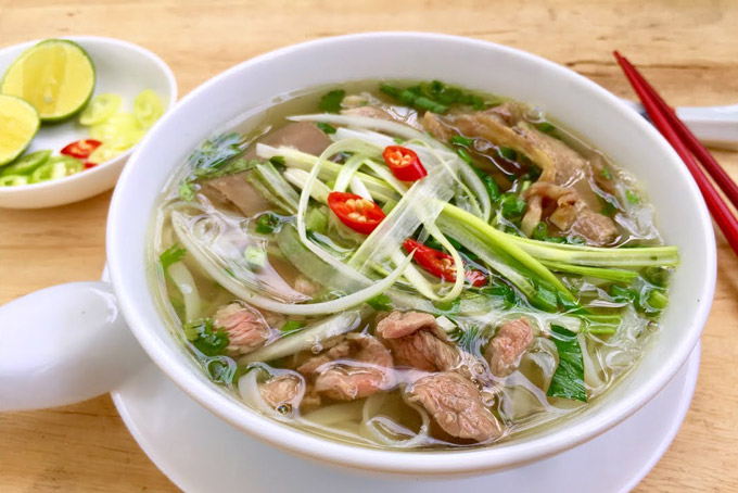 No Hanoi tourism experience is complete without a steaming bowl of pho