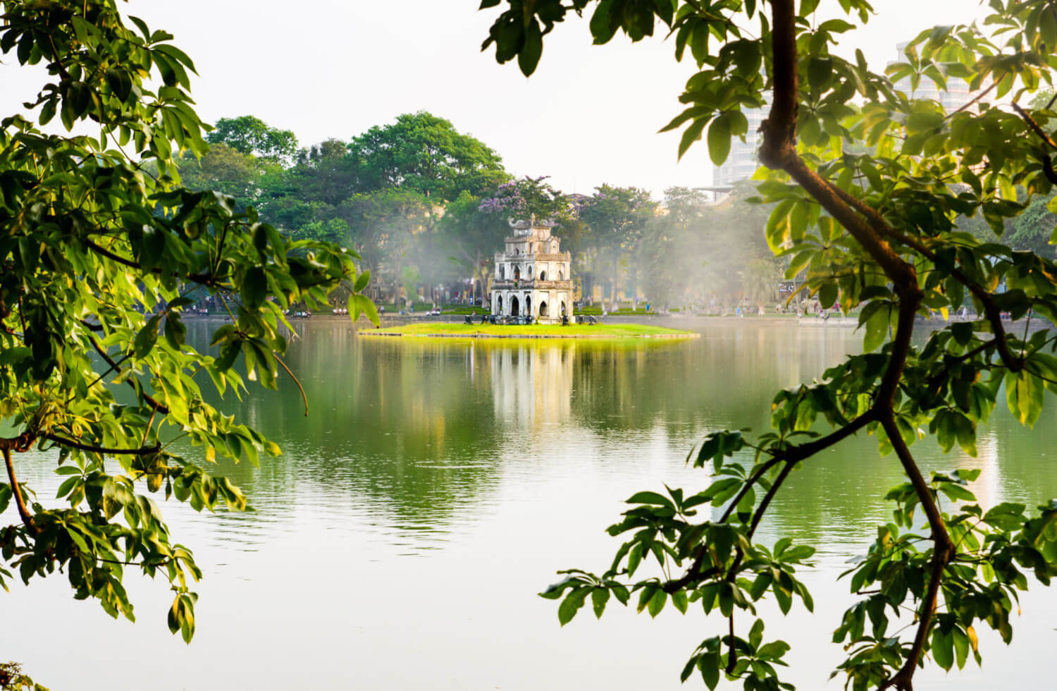 Hoan Kiem Lake is a timeless icon of Hanoi tourism — serene by day, vibrant by night.