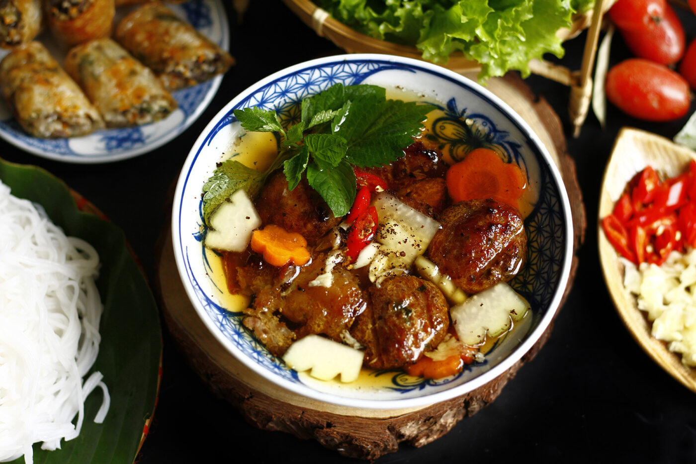 A must-try in Hanoi tourism, Bun Cha is smoky, savory, and famously Obama-approved