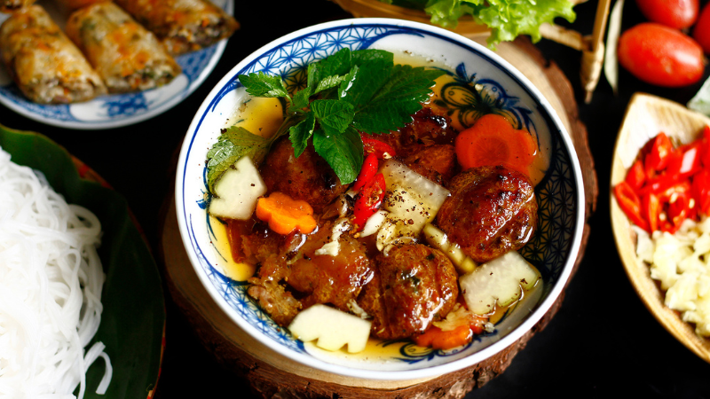 Bun cha: Hanoi’s smoky, savory lunchtime classic — best enjoyed with herbs and history