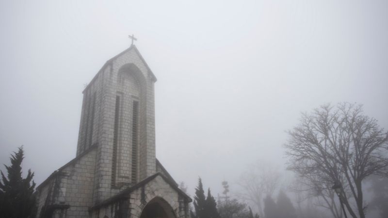 Things to do in Sapa: visit the iconic stone church for history and photos