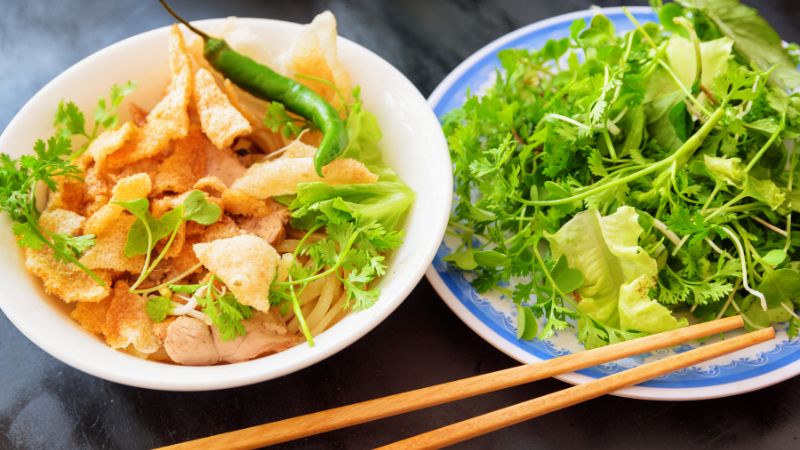 Things to do in Hoi An: Taste authentic cao lau noodles, a famous local specialty