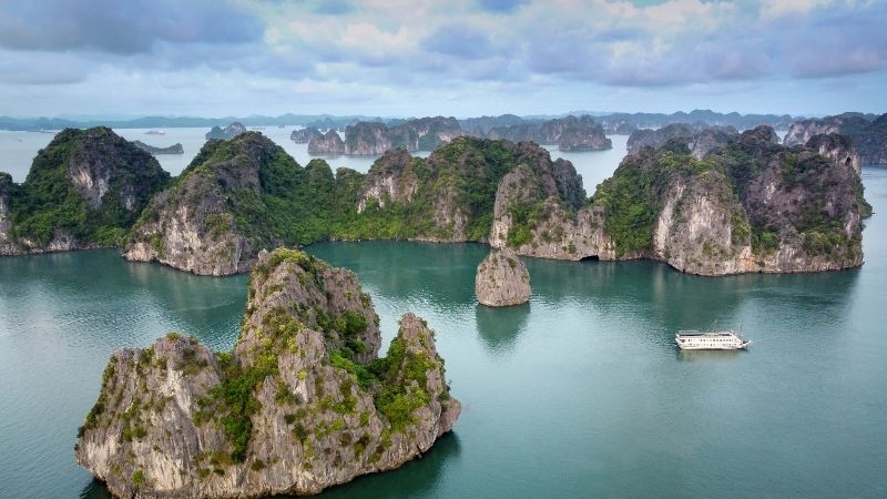 Ha Long Bay remains one of the most iconic Vietnam Places to Visit for its surreal seascape