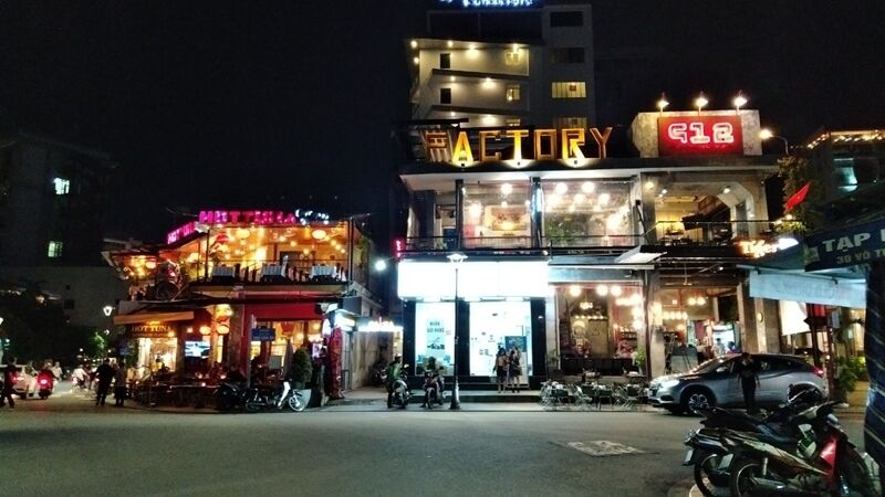 Where to Stay in Hue Vietnam: Best Neighborhoods for Every Traveler 7 Pham Ngu Lao Walking Street at night with bars and hostels – nightlife hub where to stay in Hue Vietnam for backpackers