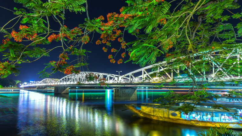 Night street food stalls near Trang Tien Bridge Hue