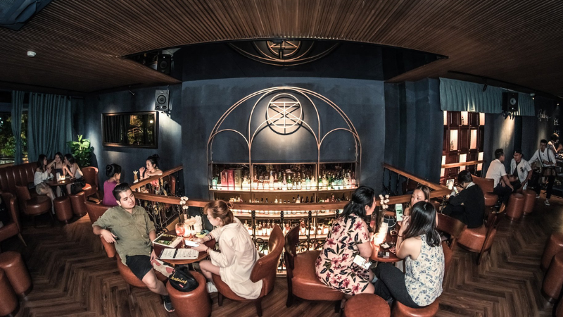 Cocktail Bars in Hanoi: A Complete Guide to the Capital’s Most Stylish Nightlife Spots 7 Artistic cocktail bar interior at Gallery Bespoke Hanoi