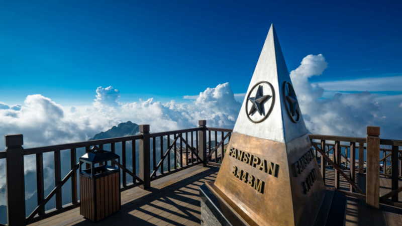 destinations to visit in Sapa Fansipan Peak mountain view above clouds
