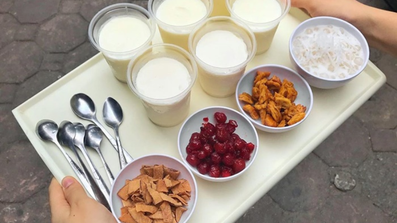 A cup of Ha Long pearl yogurt with chewy pearls, a famous local dessert in Ha Long Bay