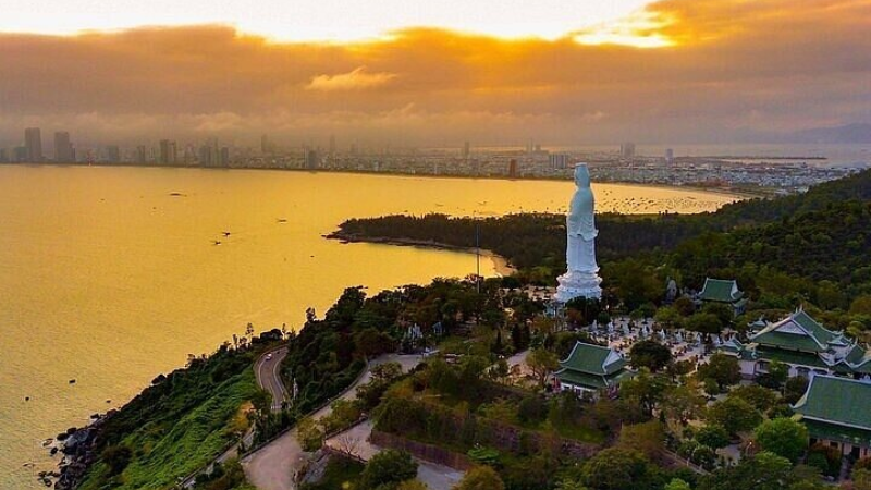 Lady Buddha Da Nang at sunset with warm golden light