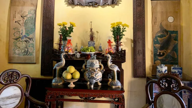 Hanoi 36 Streets — A Gentle Walking Guide Through the Old Quarter’s Living History 3 Interior courtyard of Ma May ancient house with wooden beams and narrow chambers