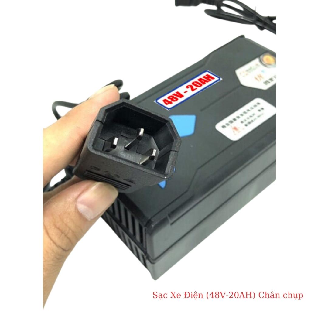 Sạc xe đạp điện, xe máy điện 48V-12Ah chân chụp 1 Sạc xe đạp điện, xe máy điện 48V-12Ah chân chụp